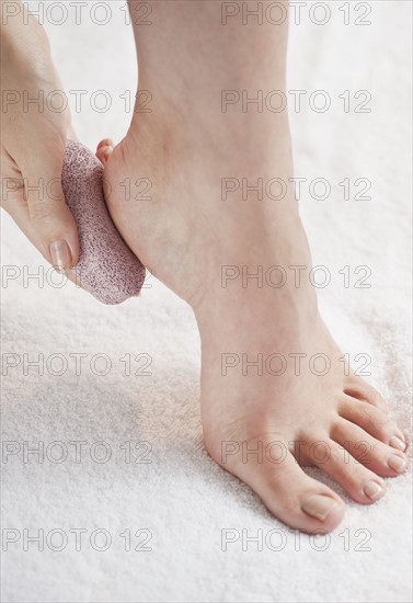 Close-up of woman's foot having pedicure.