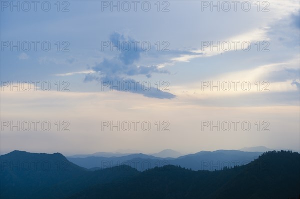 Mountain landscape with trees.