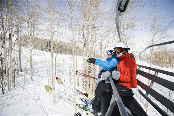 Skiers on a ski lift