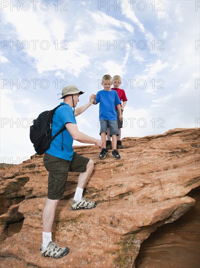 A father and two sons at Red Rock