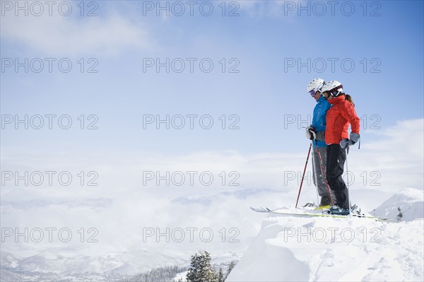 Two downhill skiers