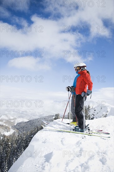 Two downhill skiers