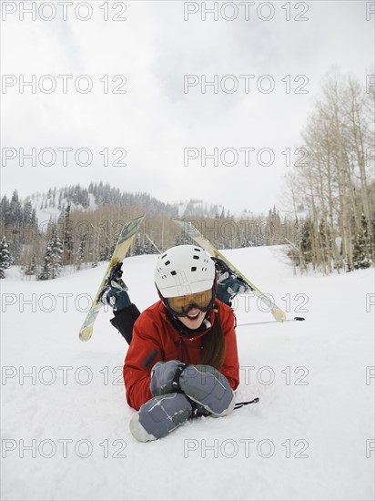A downhill skier falling