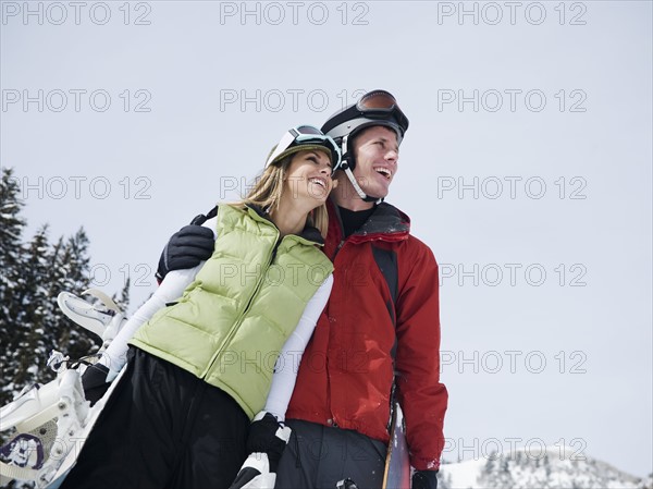 Two snowboarders