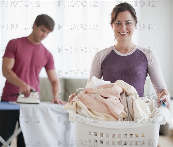 Couple doing laundry.