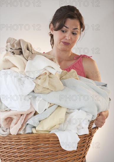 Woman doing laundry.