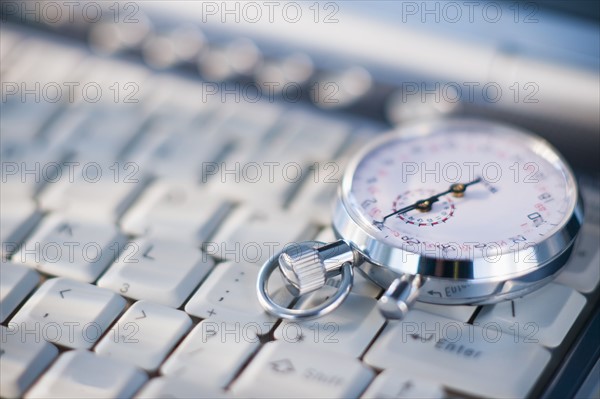 A compass on a computer keyboard.