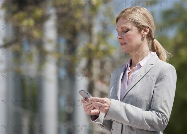 A businesswoman outdoors.