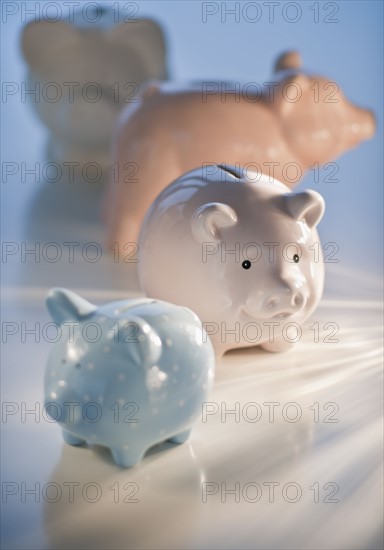 Four piggy banks.