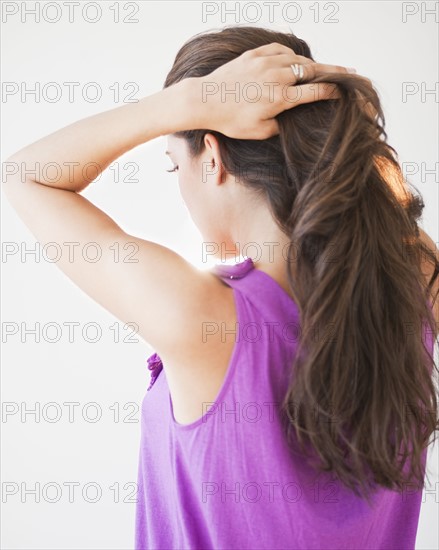 A woman with her back to camera