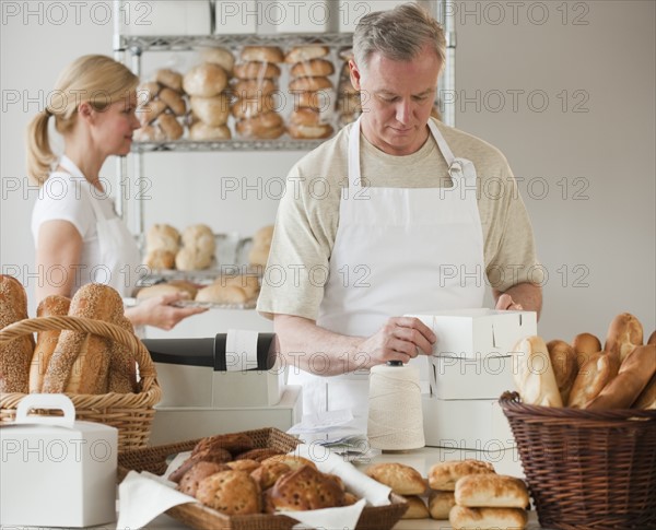 Bakers in a bakery.