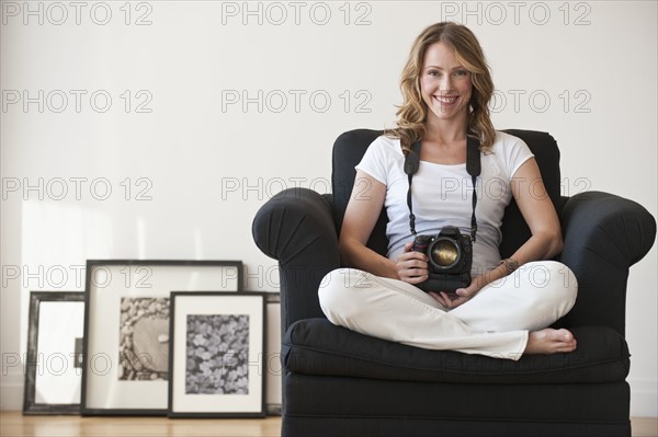 A woman with a camera.