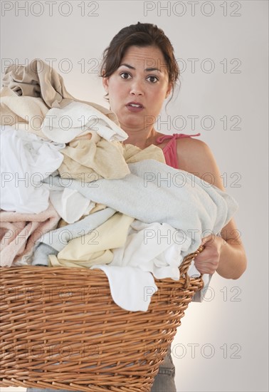 Woman doing laundry.