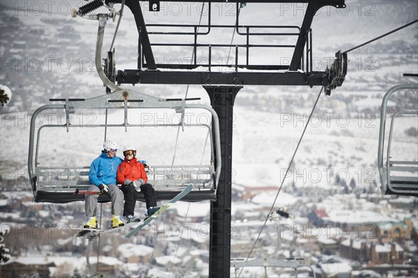 Skiers on a ski lift