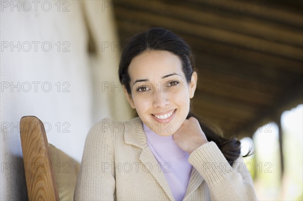 A woman outdoors smiling