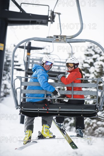 Skiers on a ski lift