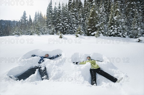 A couple outdoors in the snow