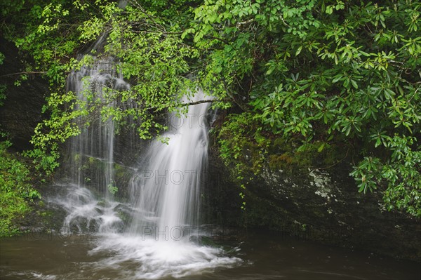 A scenic waterfall.