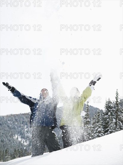 A couple outdoors in the snow