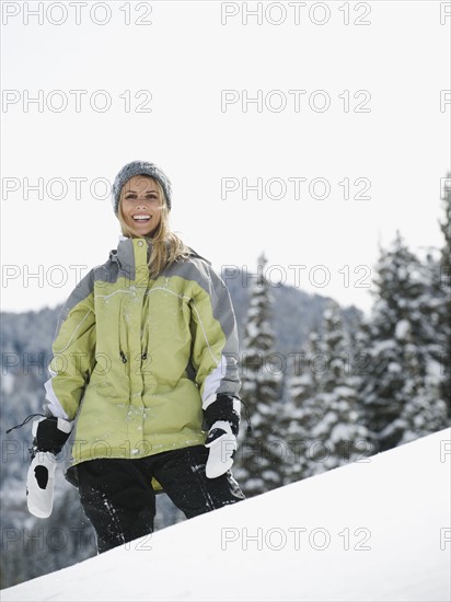 A woman standing in the snow