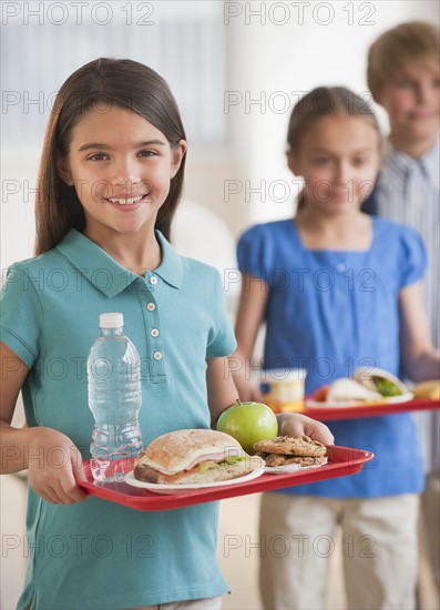 Kids in a cafeteria.