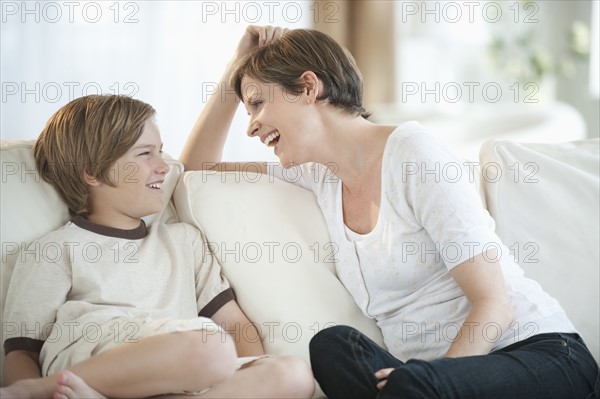 Mother talking with child.