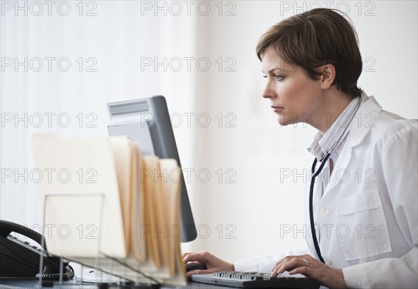 Woman working on computer.