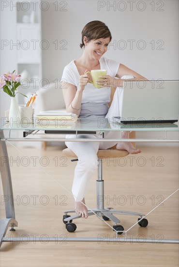 Woman at laptop.