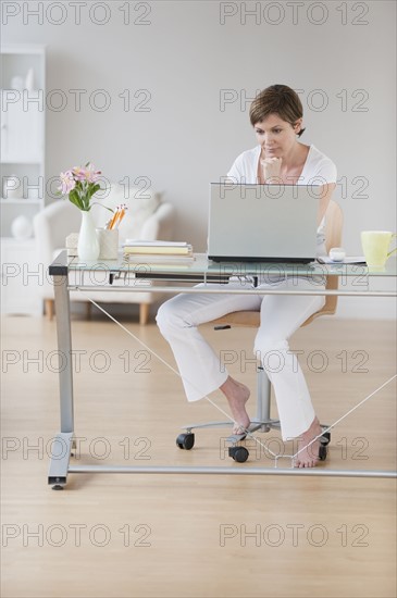 Woman at laptop.