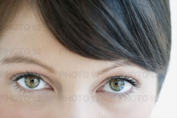 Woman looking into camera.