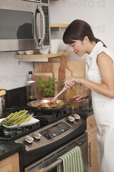 Woman cooking.