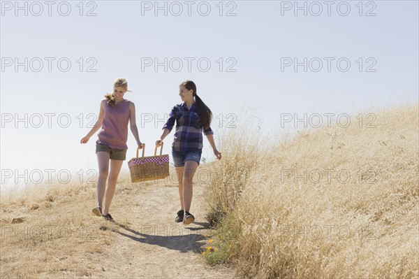 Freinds walking to picnic