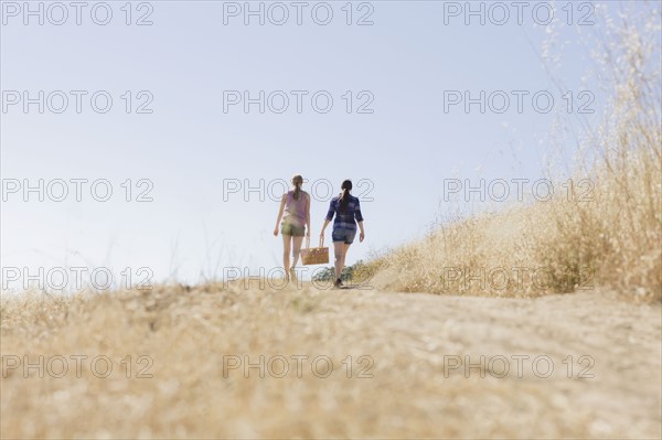 Freinds walking to picnic