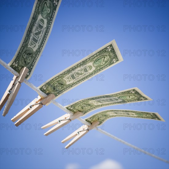 Dollars on clothes line