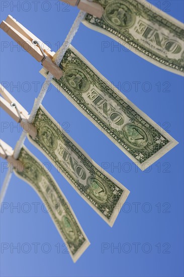 Dollars on clothes line