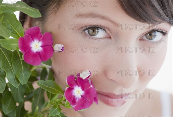 Woman looking into camera.