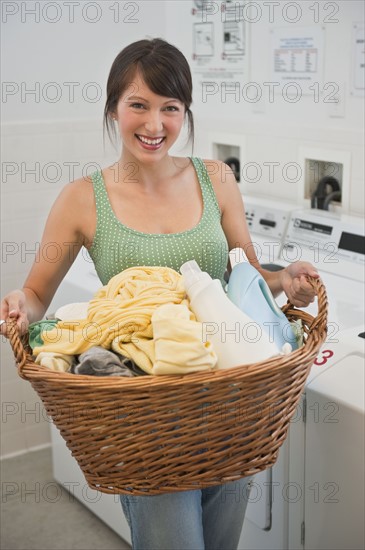 Woman washing clothes.