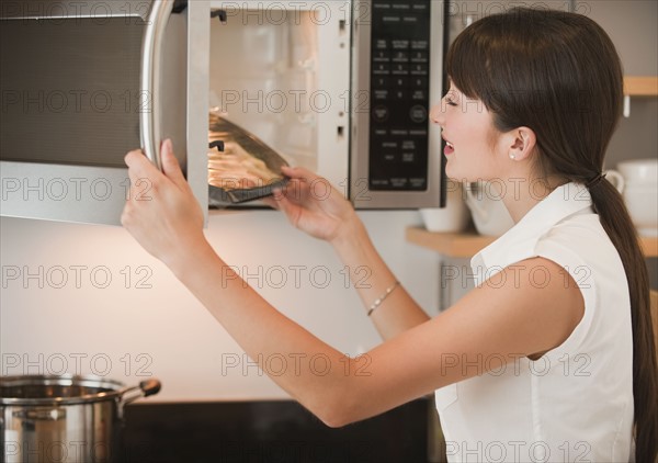 Woman cooking.