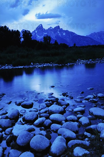 Scenic view of lake and mountains.