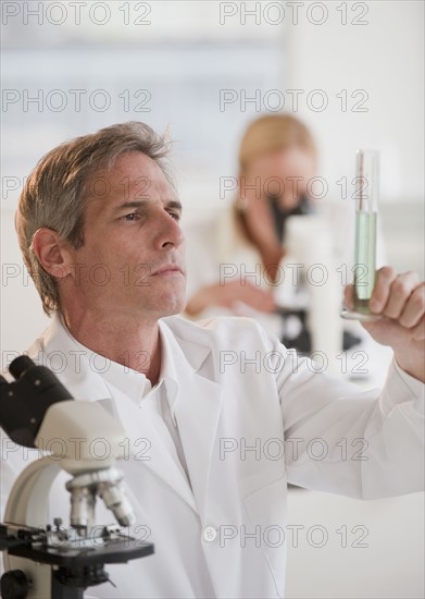 Researchers working in lab.