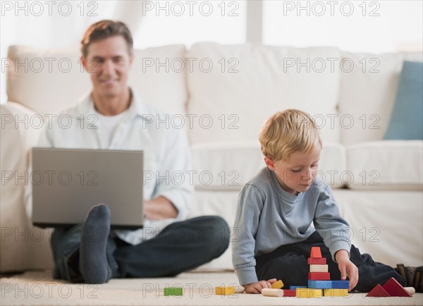 Father and child at home.