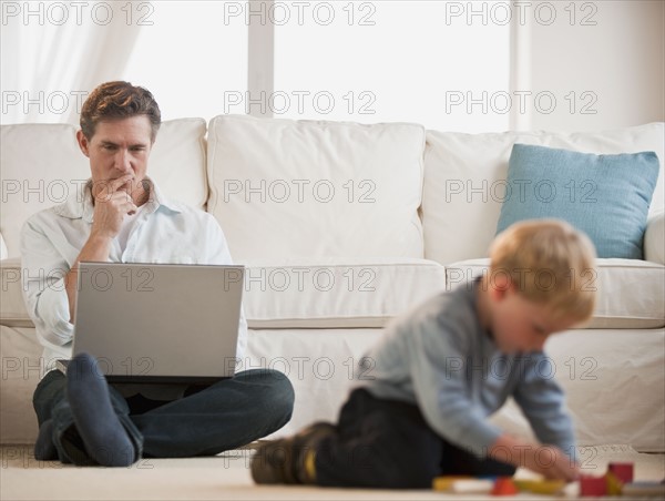 Father and child at home.