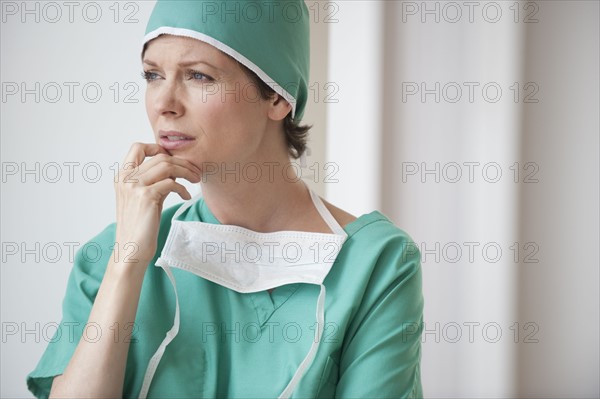 Female doctor looking concerned.