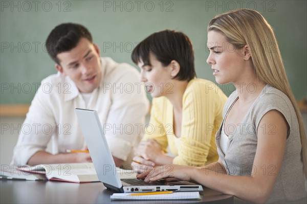 Classmates studying.