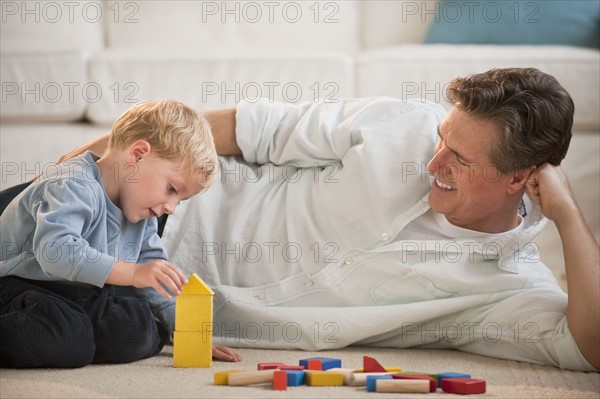 Father and child at home.