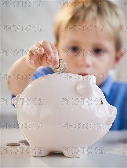 Child with piggybank.