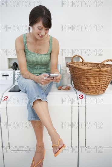 Woman in laundromat.