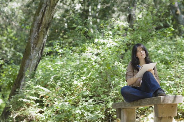 Young female in forest