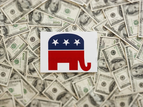 GOP symbol wtih US dollars as background