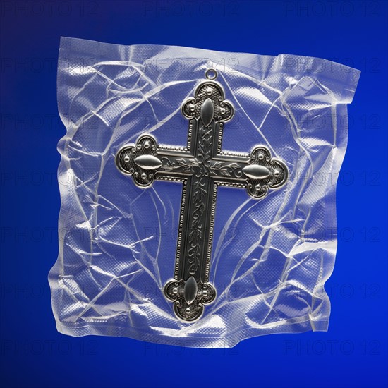 Shrink wrapped cross